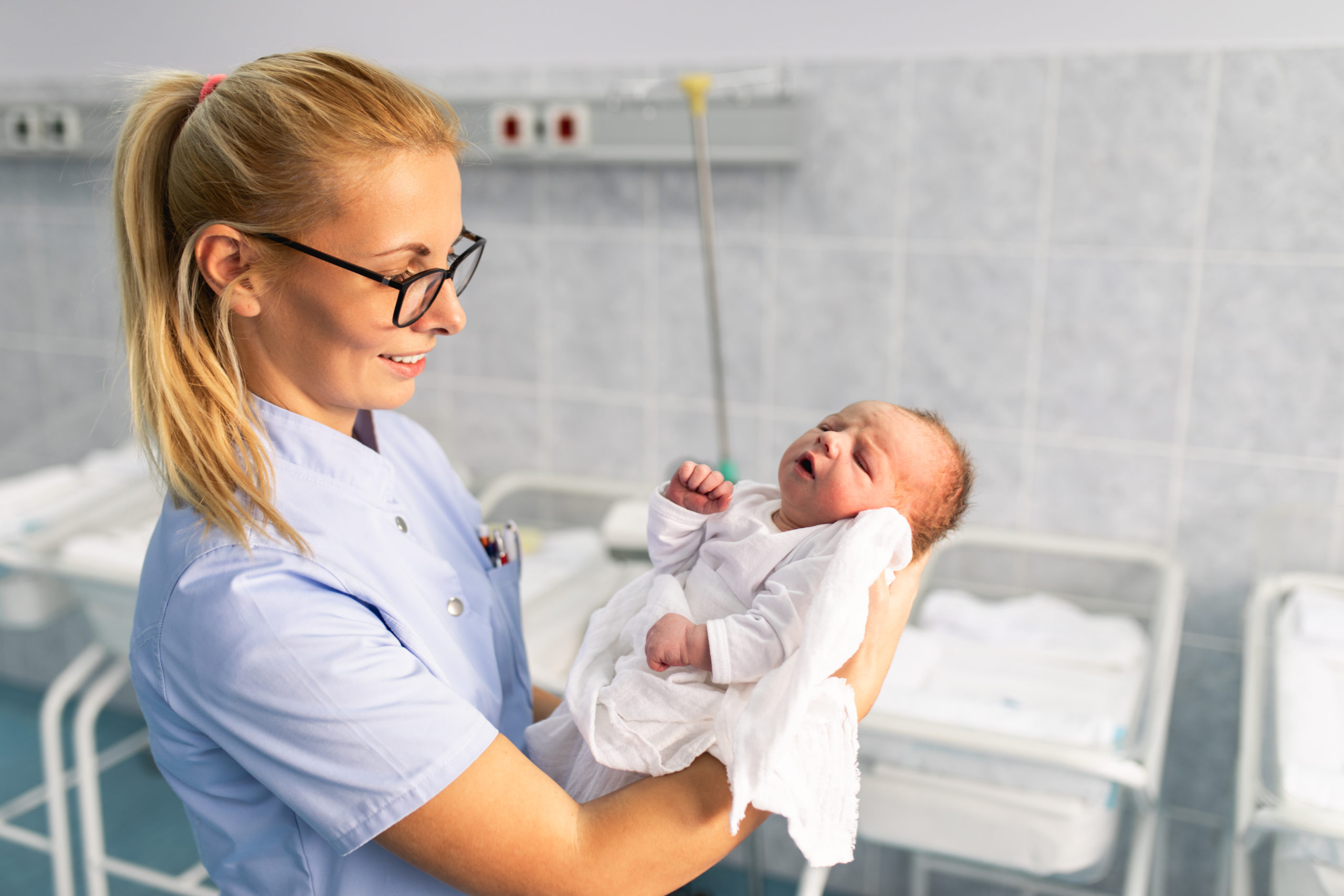 Nurse midwife and newborn